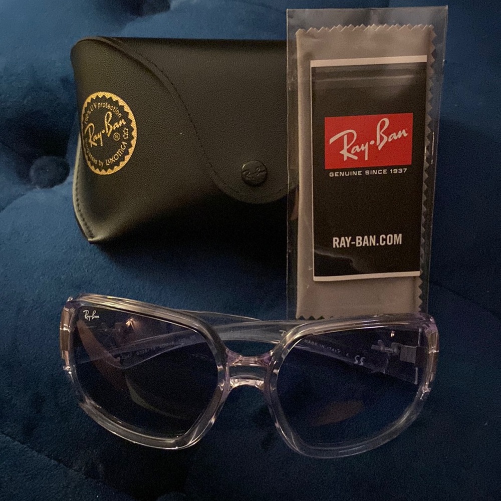 Brand new never worn Ray Bans. Clear frame with blue gradient lenses